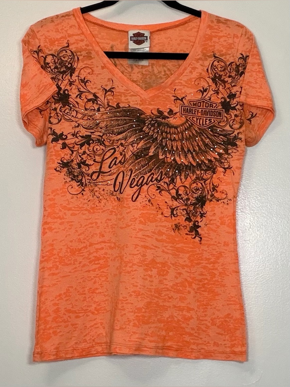 Harley-Davidson Women’s Orange V-Neck Las Vegas Wing Graphic Tee
